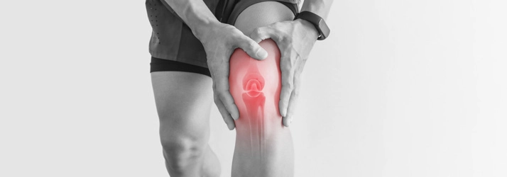 Chronic Pain Arlington WA Man Holding Knee
